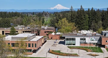 Aerial view of the Oregon city campus with Mount Hood visible on the Horizon